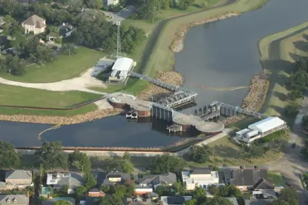 Dam and levee structure being built to prevent flooding to nearby town